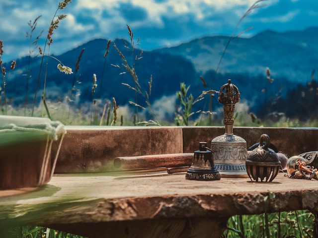 Buddhist implements with mountain background